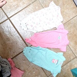 3 set of onsies 6-9 months in size. The white onsie with owls has a little stain